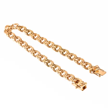 Armband bismarck i 18K guld. Det är 19 cm långt, 6,7 mm brett och väger 18,1g. Kistlås. Stämplat JRA (J Antar Guld) 18K & kattfot. Mycket fint skick!