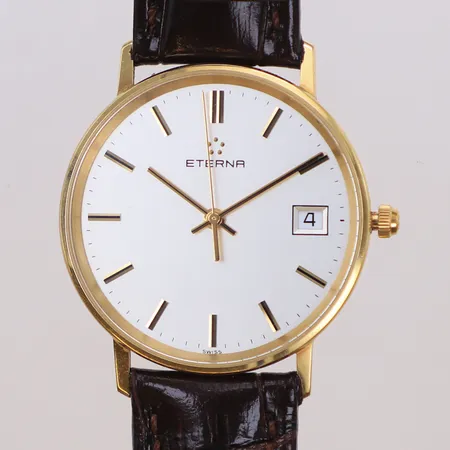 Herrur Eterna 18K, quartz, datum, läderband, Ø 33mm, gravyr, inga övriga tillbehör, 18K 