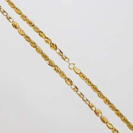Kedja, längd: 50,5cm, bredd: 3,5mm, lås i 18K ej original, skeva länkdelar, ostämplad, 21K, bruttovikt 13,2g Vikt: 13,2 g