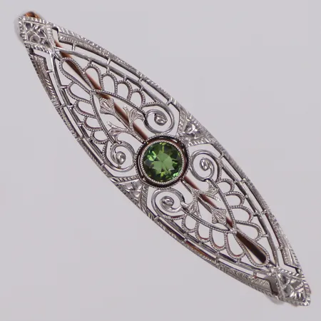Brosch med grön peridot, längd 45mm, 14K Vikt: 3,6 g