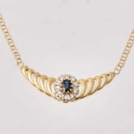 Collier i 18K guld, 42,5cm, Bismarck, bredd 2,5-12mm, 1st blå sten, mått4x6mm, 10st diamanter, mått Ø1,7mm, vikt 7,07g.