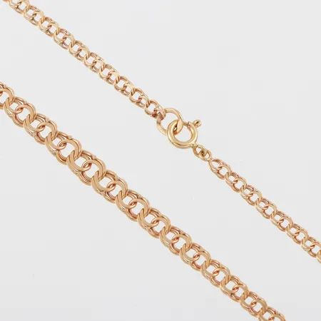 Collier Bismarck, längd ca 43 cm, bredd 3-5.2 mm, 18k. Vikt: 7,5 g