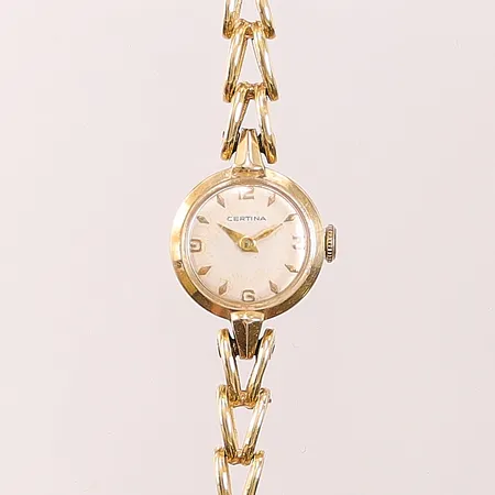 Damur Certina 14K, 18mm, manuell, länk i 18K, längd inklusive uret: 17,5cm, bredd: 5,9mm, 21,3g.