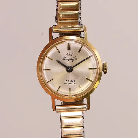 Damur Magific 18K, 19mm, manuell, flexband.
