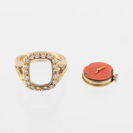 Klockring med diamantkrans, defekt urtavla, fungerar ej, storlek 18 mm, bredd 4.9-18.6 mm, 18k, totalvikt 20.5 gram. Vikt: 20,5 g