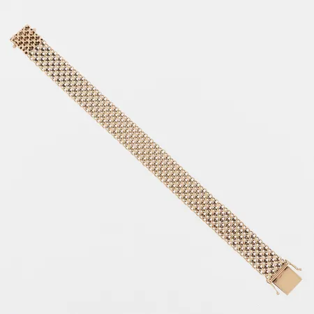 Armband X-länk, längd ca 19 cm, bredd 13.5 mm, 18k. Vikt: 23,7 g