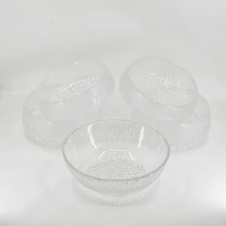 Iittala, Ultima Thule, Tapio Wirkkala, 4 dessertskålar i glas, Ø11 cm, höjd 4½ cm, 1 skål i glas, 14 cm, höjd 4½ cm.