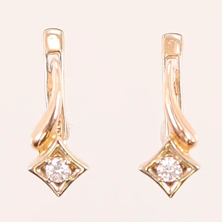 Ett par örhängen, diamanter 2x ca 0,05ct 14mm, 14K 2,4g.