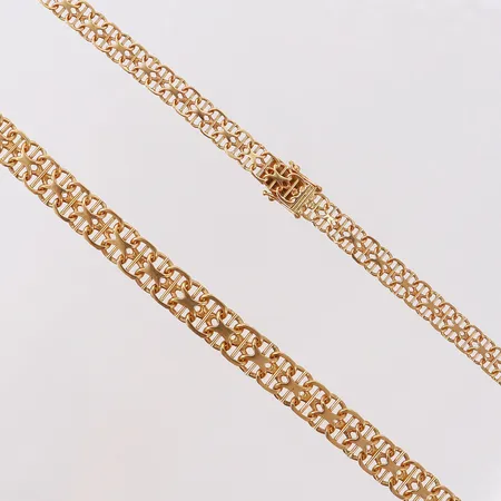 Kedja X-länk med stav, längd 42,5cm, bredd 6,52-9mm, doserad, 18K.  Vikt: 30,8 g