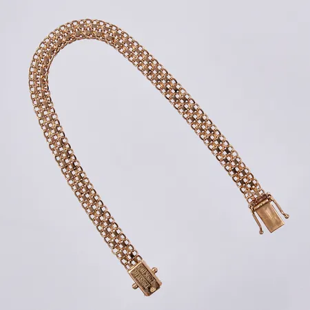Armband X-länk, N S E Guldvaru Aktiebolag 1967, längd ca 19cm, bredd ca 7mm, 18K Vikt: 10,5 g