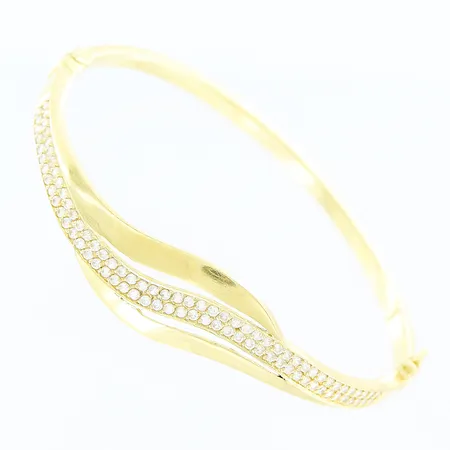 Stelt armband, innermått 50x59mm, buckla, innerskena i metall, 18K Vikt: 10,4 g