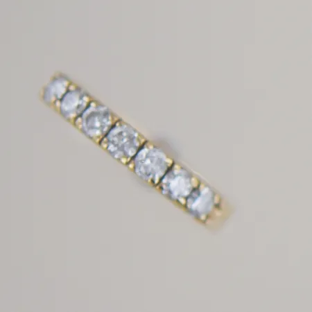 Alliansring med 7 diamanter 0,49 ct, Ø 16 mm, 18k Vikt: 3 g