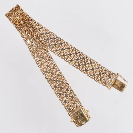 Armband, X-länk med stav, Stockholms Ädelsmide år 1965, 19cm, bredd 11,5mm,en låsåtta saknas, 18K  Vikt: 19,5 g