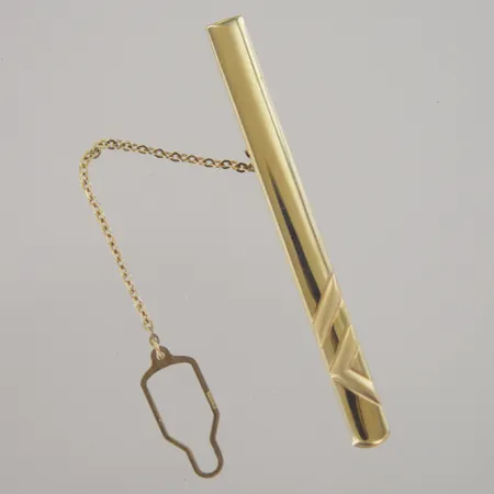 Slipshållare, längd 6,5 cm, bredd 0,5 cm, 18K/Metall Vikt: 6,7 g