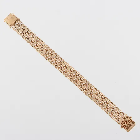 Armband X-länk med stavar, längd ca 19.5 cm, bredd 14.8 mm, 18k. Vikt: 35,6 g