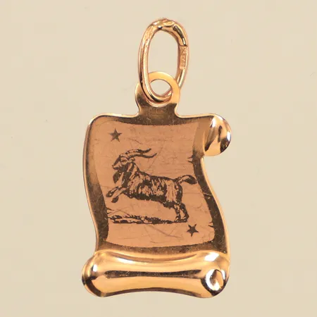 Hänge stenbock, längd 24mm inklusive ögla, bredd 12,5mm, 14K  Vikt: 0,7 g