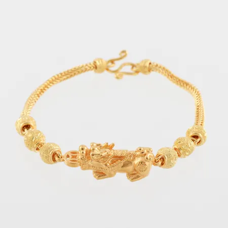 Armband, längd ca 19 cm, bredd 3.3-11.2 mm, 23k,thai. Vikt: 15,2 g