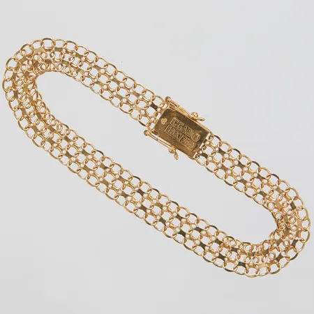 Armband X-länk, längd ca 18,5cm, bredd 8mm, 18K Vikt: 8,2 g