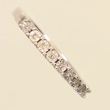 Ring, diamanter 9x0,005ct, stl 17,  bredd 1,9-2,2mm, vitguld, GHA, 18K  Vikt: 2,8 g