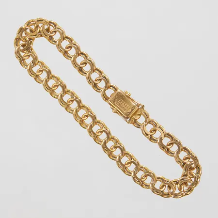 Armband Bismarck, längd ca 19,5cm, bredd 7,5mm, bruksslitage, 18K Vikt: 19,5 g