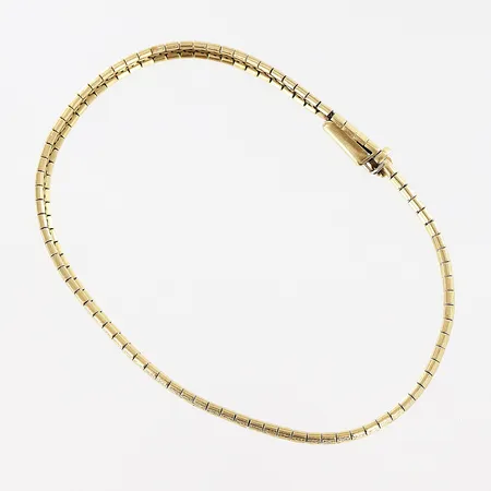 Armband, halvstelt, mönster, 18,3cm, bredd 4mm, låsåtta behöver justeras, smärre skevheter, 14K.  Vikt: 9,2 g