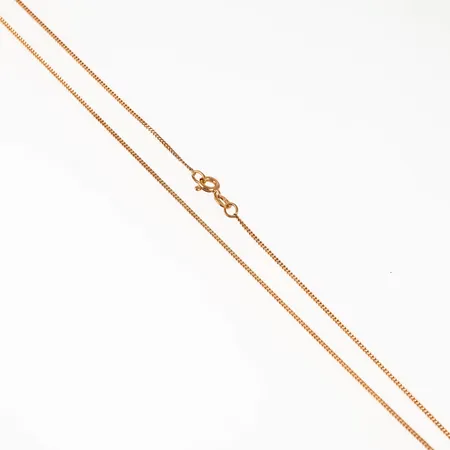 Kedja pansar i 18K guld. Den är 39,5 cm lång, 1,1 mm bred och väger 2,1g. Springring. Från Balestra. Fint skick.