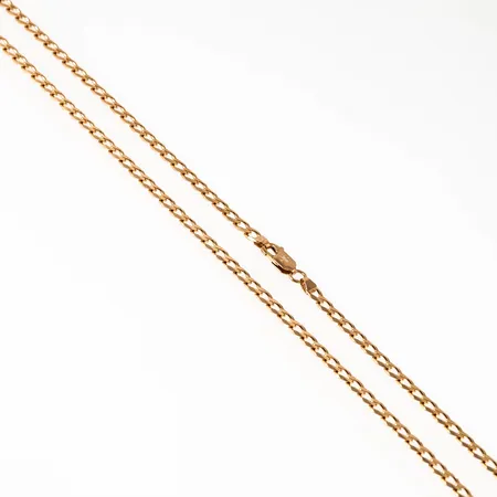 Gles, kantslipad pansarkedja i 18K guld. Den är 60 cm lång, 3,6 mm bred och väger 16,1g. Karbinhake. Från Balestra. Fint skick.