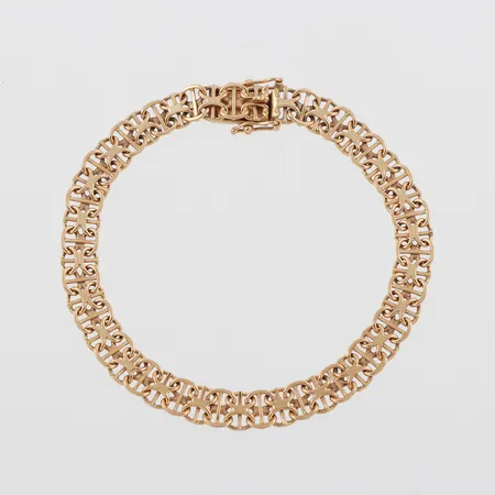 Armband, X-länk med stav, längd ca 18.5 cm, bredd 6.7 mm, 18k. Vikt: 11,2 g