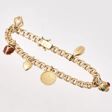 Armband i 18K guld, 19cm, Bismarck, bredd 5,5mm, 6st berlocker, vikt 18,22g.