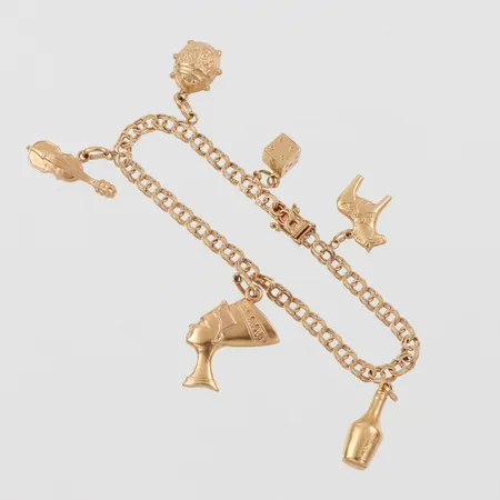 Armband Bismarck med 6 st berlocker, längd ca 18 cm, bredd 4.5 mm, 18k. Vikt: 13,5 g