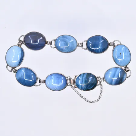 Armband med blåa stenar, längd 22,5 cm bredd 15 mm, silver 830/1000. Vikt: 38,4 g
