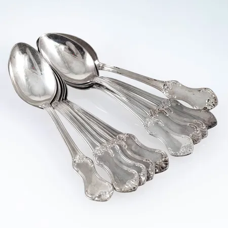 Olga i silver (830/1000): tio kaffeskedar (120 mm). De väger 160,7g. Fläckar/ svärta.