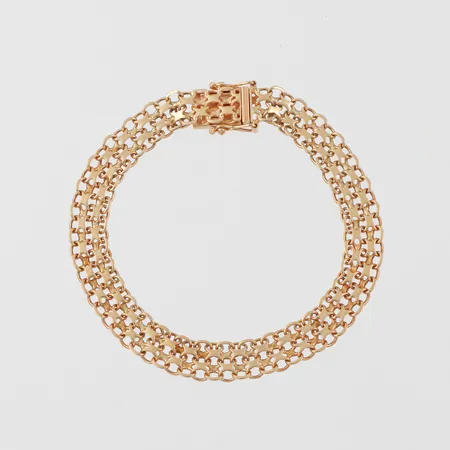 Armband X-länk, längd ca 18.5 cm, bredd 8.1 mm, 18k. Vikt: 11,6 g