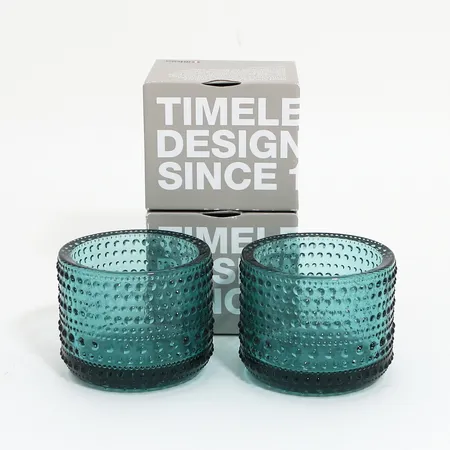 Två ljuslyktor Iitala, höjd:64mm, Ø75mm, färg Sea blue, i originalkartonger Skickas med paket.