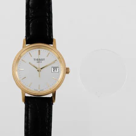 Damarmbandsur Tissot, diameter ca 23.3 mm,fungerar ej troligen batteriet,gravyr,18k.