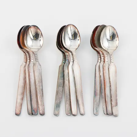 Kaffeskedar 12 st, nysilver, G.A.B, längd ca 11.5 cm. Vikt: 0 g Skickas med paket.