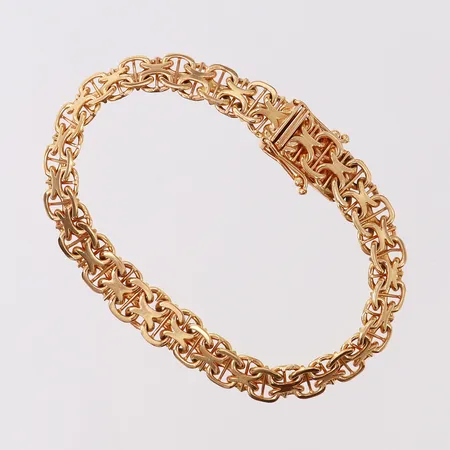 Armband X-länk med stav, längd 15,5cm, bredd 7,3mm, 18K.  Vikt: 13,4 g