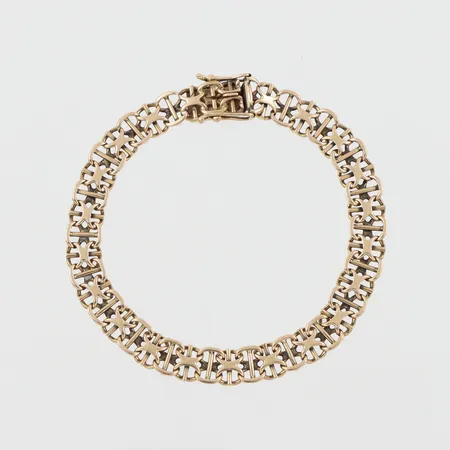 Armband X-länk, slitage, längd ca 21 cm, bredd 8.5 mm, 18k. Vikt: 19,3 g