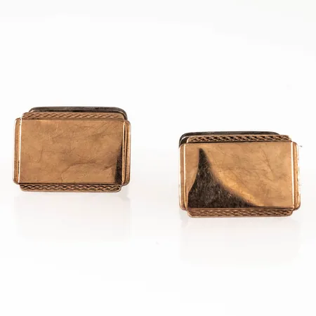 Manschettknappar i silver från 1952. Motiven (18,5 x 13 mm) är delvis förgyllda. De väger 9,3g.