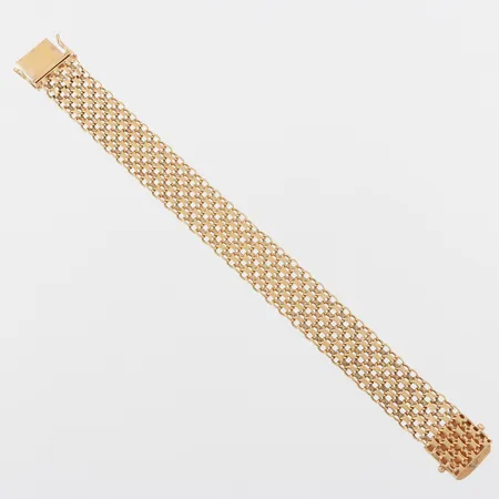 Armband X-länk, längd ca 19 cm, bredd 15.8 mm, 18k.  Vikt: 30,9 g
