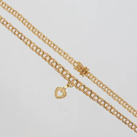 Collier doserad Bismarck, integrerat hänge hjärta, diamanter 9 x ca 0,005ct, bredd 4-22mm, 18K Vikt: 16,2 g