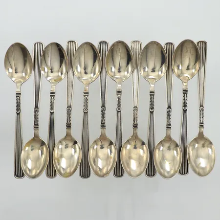 Tolv moccaskedar, längd 10cm, Markströms Guldsmeds Ab K G, år 1952, silver Vikt: 108,4 g