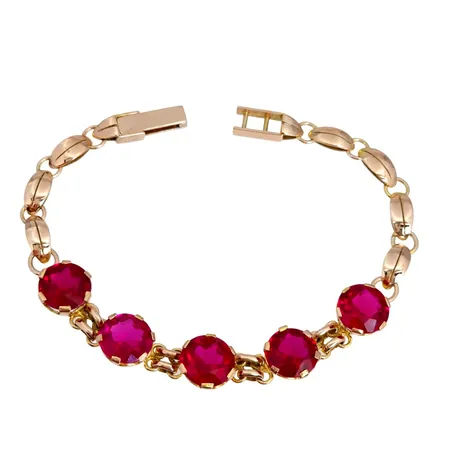 Armband, 14K guld, syntetiska Rubiner Ø 10 mm, längd 19,5 cm, bredd 11 mm, stenar utan anmärkning, fint skick Vikt: 15,1 g