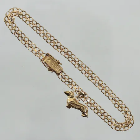 Armband X-länk med berlock tax, längd 19cm, bredd 4,8mm, skev länk, bucklig, 18K  Vikt: 5,7 g