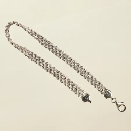 Armband vitguld, flätad, längd 19cm, bredd 5mm, 18K Vikt: 4,3 g