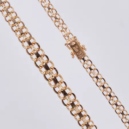 Collier doserad X-länk, längd: ca 44cm, bredd: ca 5-8mm, ÄSA, Ädelsmycken Aktiebolag, Stockholm, år 1972, 18K  Vikt: 18,1 g