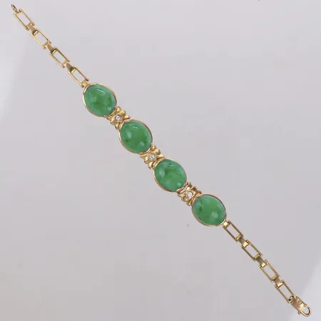Armband med vita samt gröna stenar, längd 17cm, bredd 4,0-7,0-12,3mm, 14K   Vikt: 13,8 g