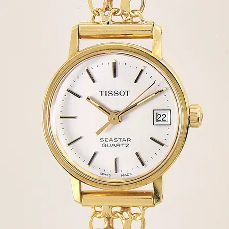 Damur Tissot, 18K, quartz, Ø22mm, datum, plexiglas, X-länk 18K, längd 19cm, behov av batteribyte, gravyr, etui, brv: 21,8g