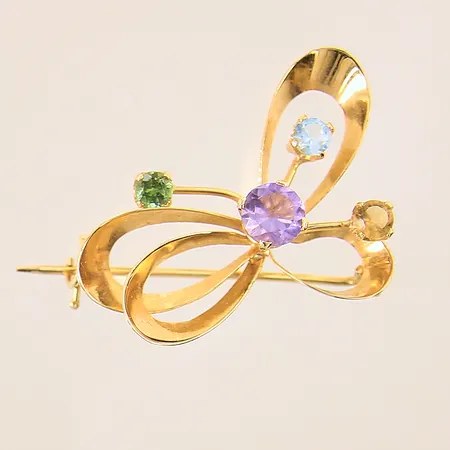 Brosch med färgade stenar, 30x22mm, 18K Vikt: 3,8 g