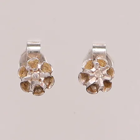 Ett par örhängen, diamanter 2x ca 0,01ct, 10mm, 18K 1,2g.